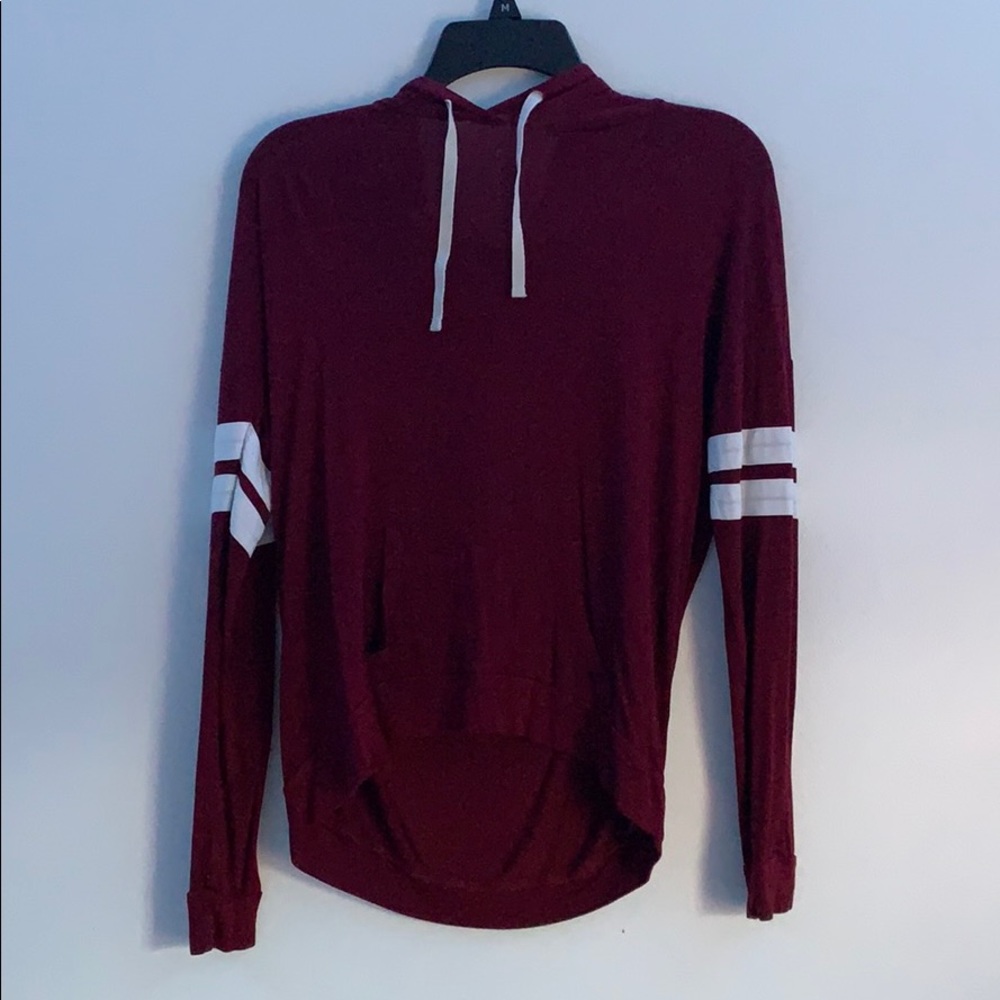 Hooded long sleeved maroon shirt